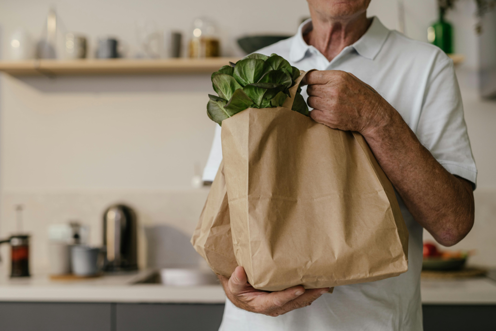 Person carrying a grocery bag to represent gifts that reduce mental load for people wih ADHD